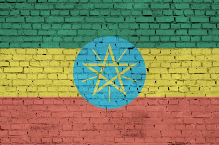 Ethiopia flag is painted onto an old brick wall